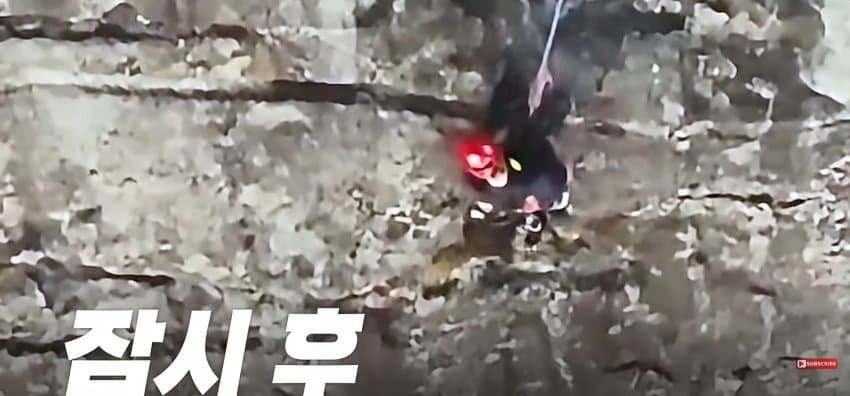 등반 중 절벽에 갇히자, 벽 잡고 한손으로 셀프 신고한 남자 (20)