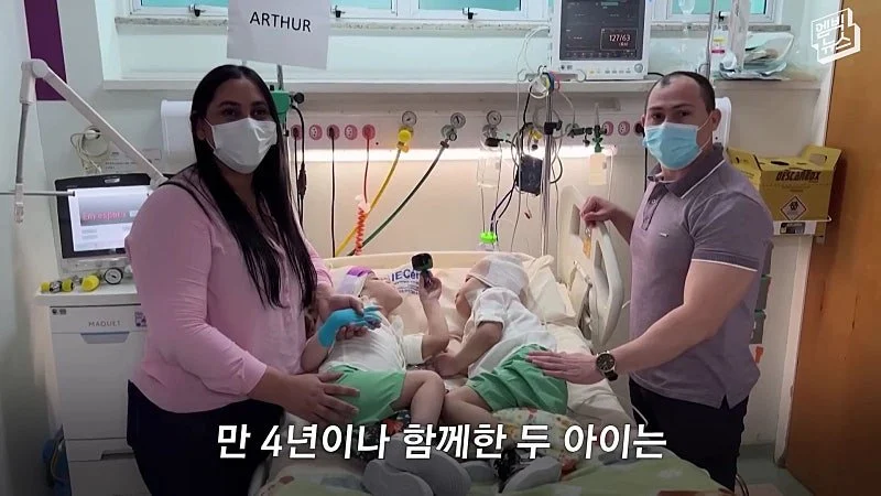 33시간 수술 끝에 얼굴 본 쌍둥이 (32)
