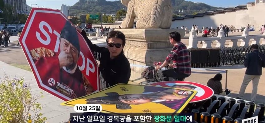 광화문 일대에 나타난, 코 막은 조선 왕 정체 (3)